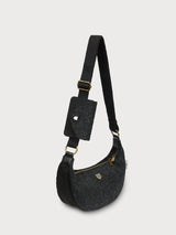 czarna torebka w jodełkę na ramię i regulowanym paskiem