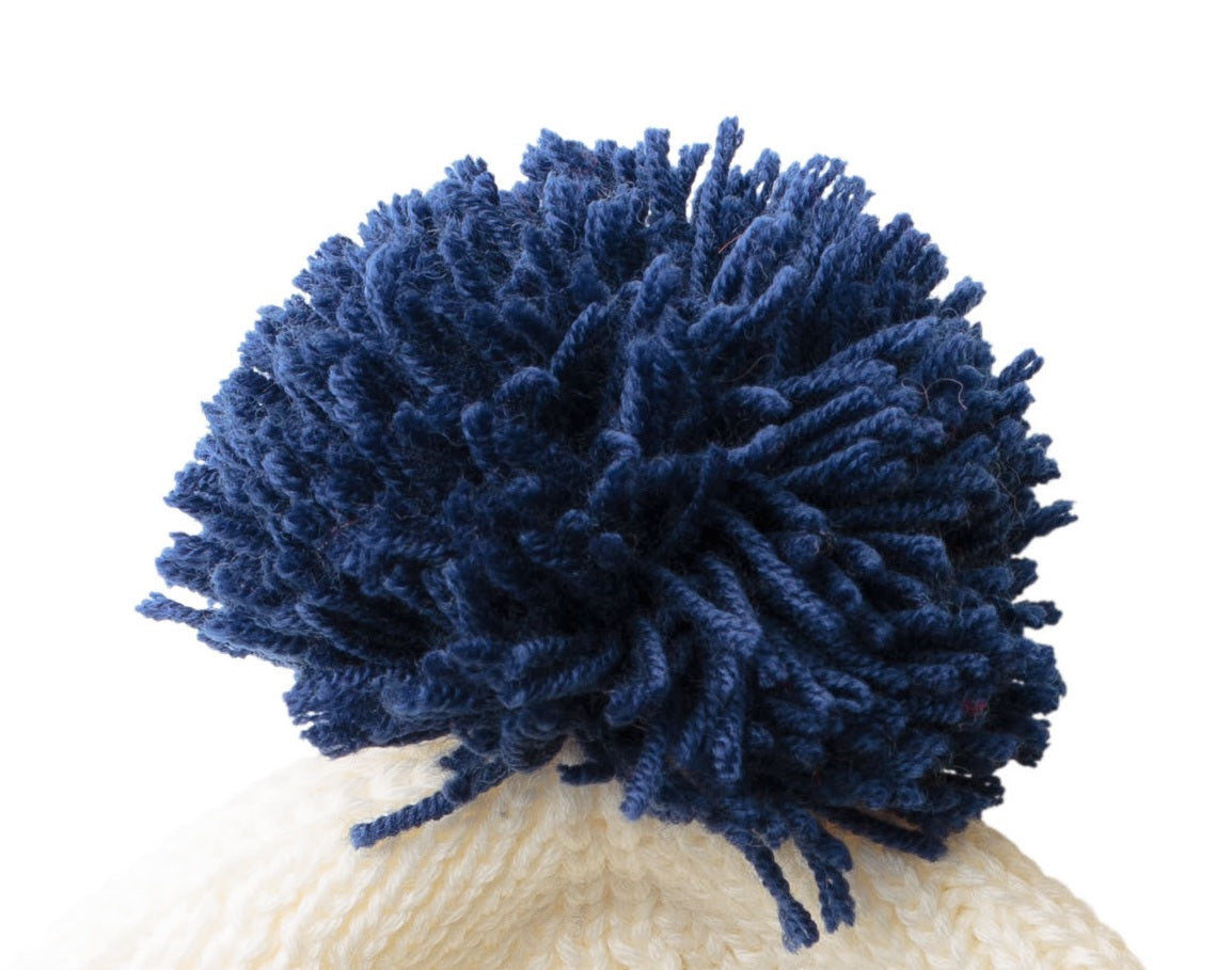pompon granatowy