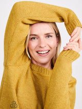 wiosenny sweter damski z wełny merino z okraglym dekoltem w kolorze musztardowym